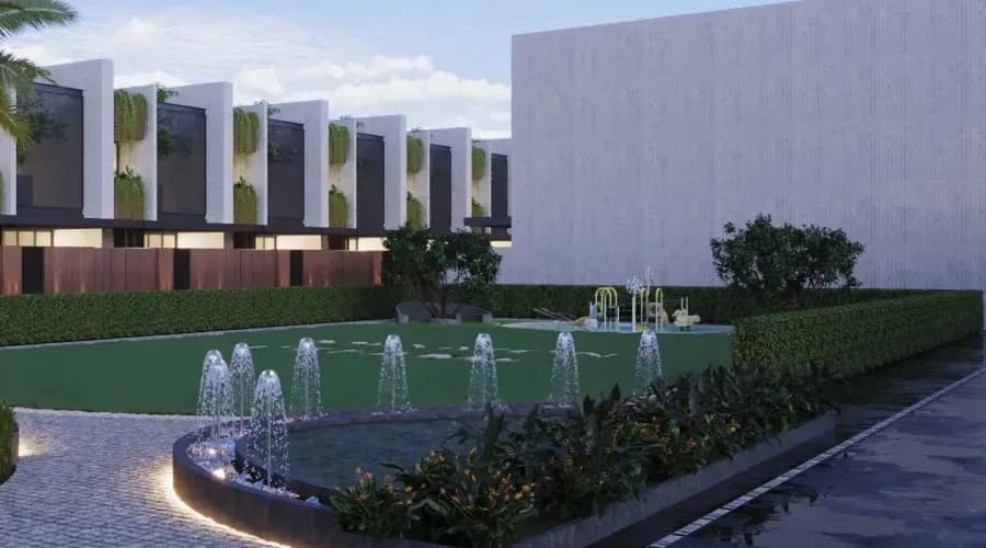Landscaped lawn with fountains beside the villas at Mexmon Dreams-1 (render)